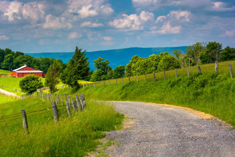 Farm fields along a dirt road in the rural Potomac Highlands of West Virginia.